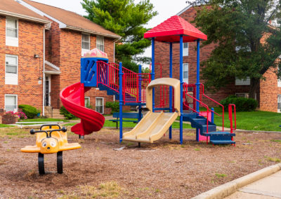 Playground area with a multi-colored jungle gym