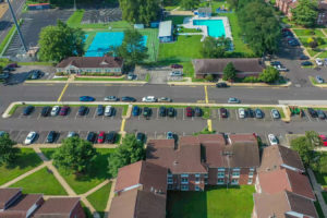 View of parking lots and outdoor recreation for the community members at Creekside Apartments