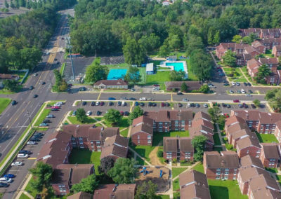 Side aerial view of the exterior of Creekside Apartments in Bensalem, PA