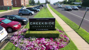 Road sign for Creekside Apartments in Bensalem, PA